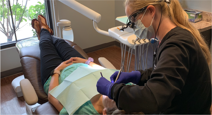 patient receiving dental treatment by Sinquefield Family Dentistry 3